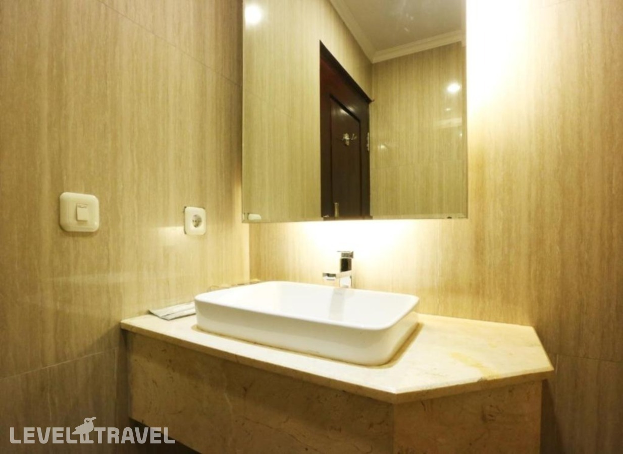 фотографии номера Семейный номер отеля Coin's Hotel Jakarta в Индонезия(Джакарта) - фото №3