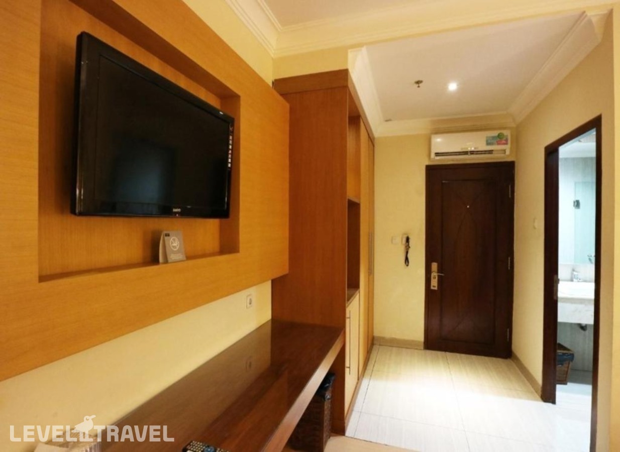 фотографии номера Семейный номер отеля Coin's Hotel Jakarta в Индонезия(Джакарта) - фото №7