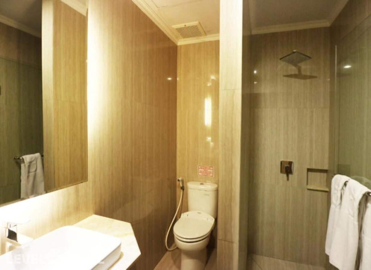 фотографии номера Семейный (две односпальные кровати) отеля Coin's Hotel Jakarta в Индонезия(Джакарта) - фото №4