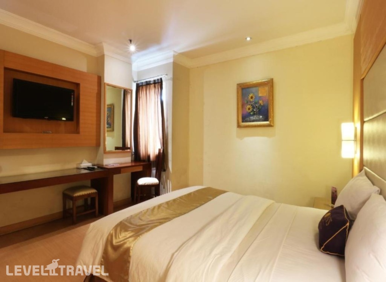 фотографии номера Делюкс отеля Coin's Hotel Jakarta в Индонезия(Джакарта) - фото №5