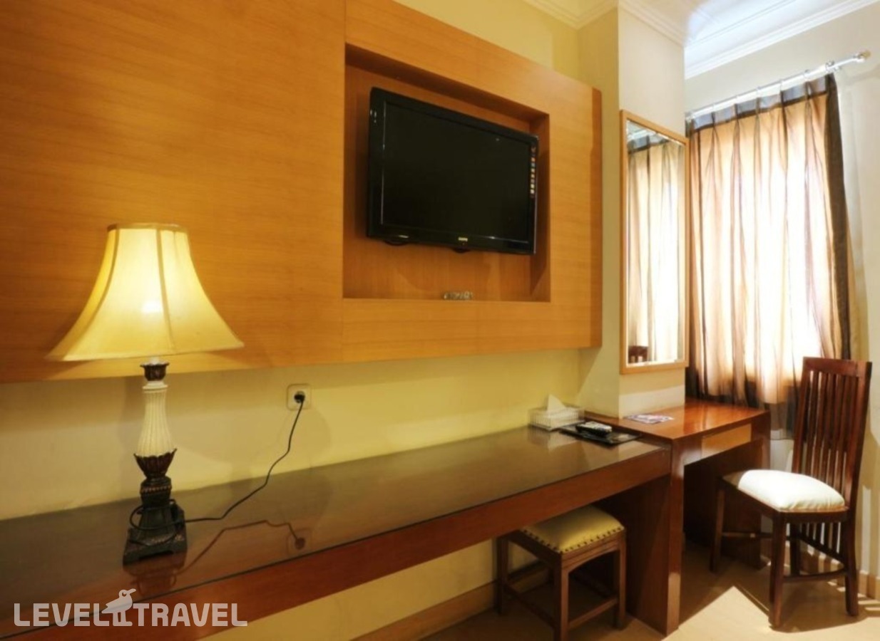 фотографии номера Делюкс отеля Coin's Hotel Jakarta в Индонезия(Джакарта) - фото №10