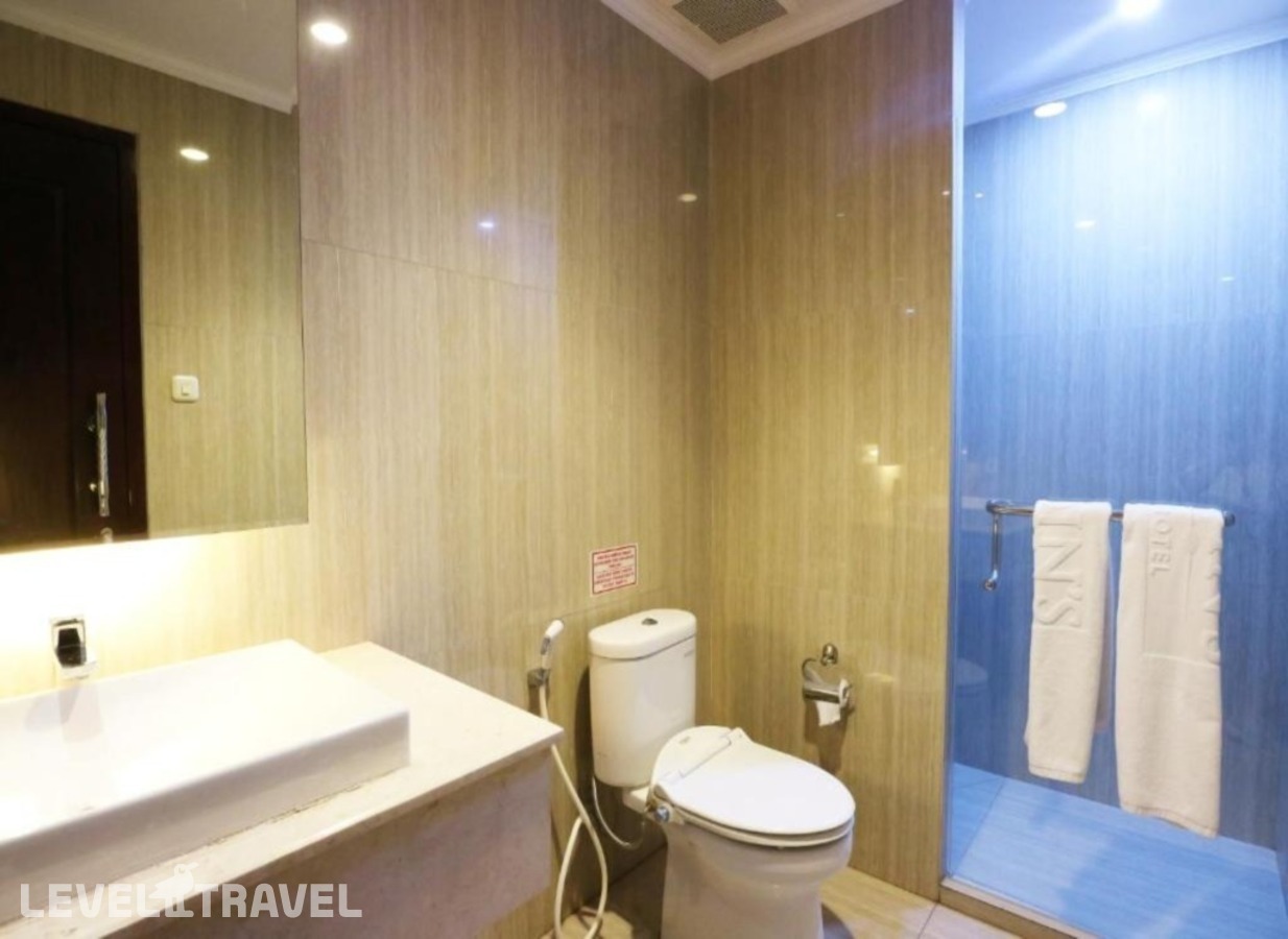 фотографии номера Делюкс отеля Coin's Hotel Jakarta в Индонезия(Джакарта) - фото №8