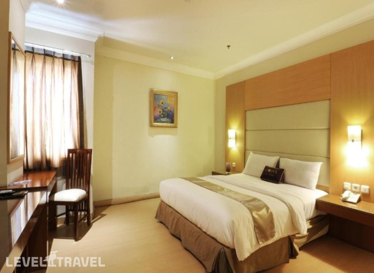 фотографии номера Делюкс (две односпальные кровати) отеля Coin's Hotel Jakarta в Индонезия(Джакарта) - фото №6