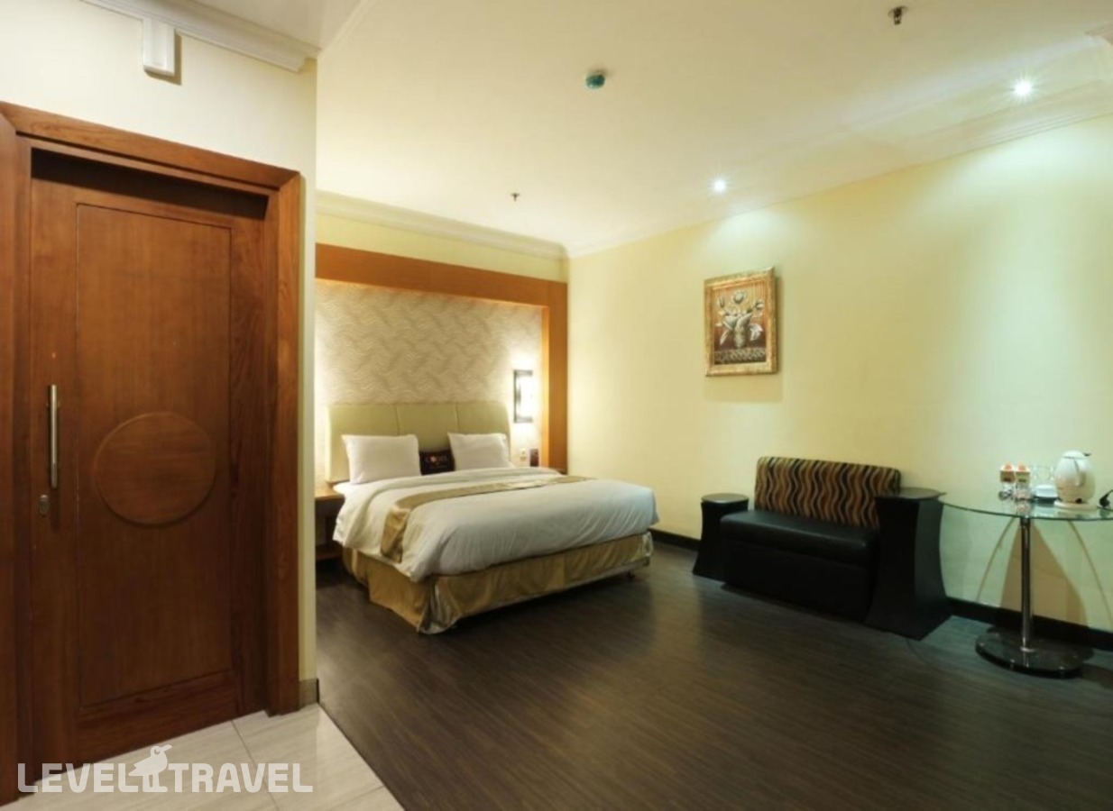 фотографии номера Номер Представительский отеля Coin's Hotel Jakarta в Индонезия(Джакарта) - фото №2