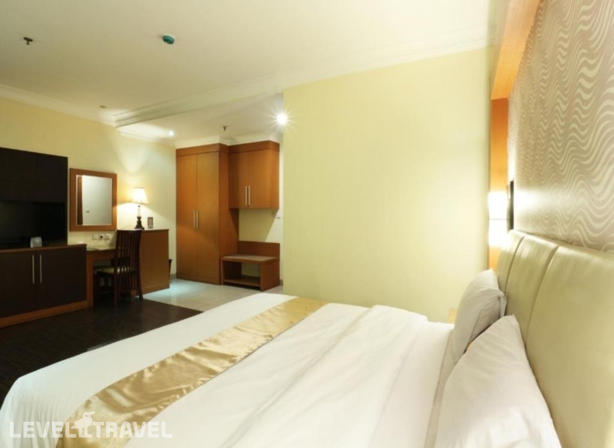 фотографии номера Номер Представительский отеля Coin's Hotel Jakarta в Индонезия(Джакарта) - фото №5