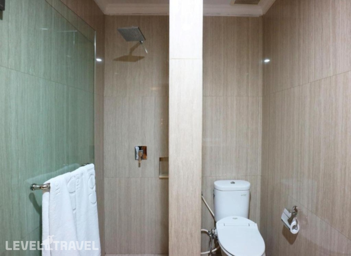 фотографии номера Номер Представительский отеля Coin's Hotel Jakarta в Индонезия(Джакарта) - фото №3