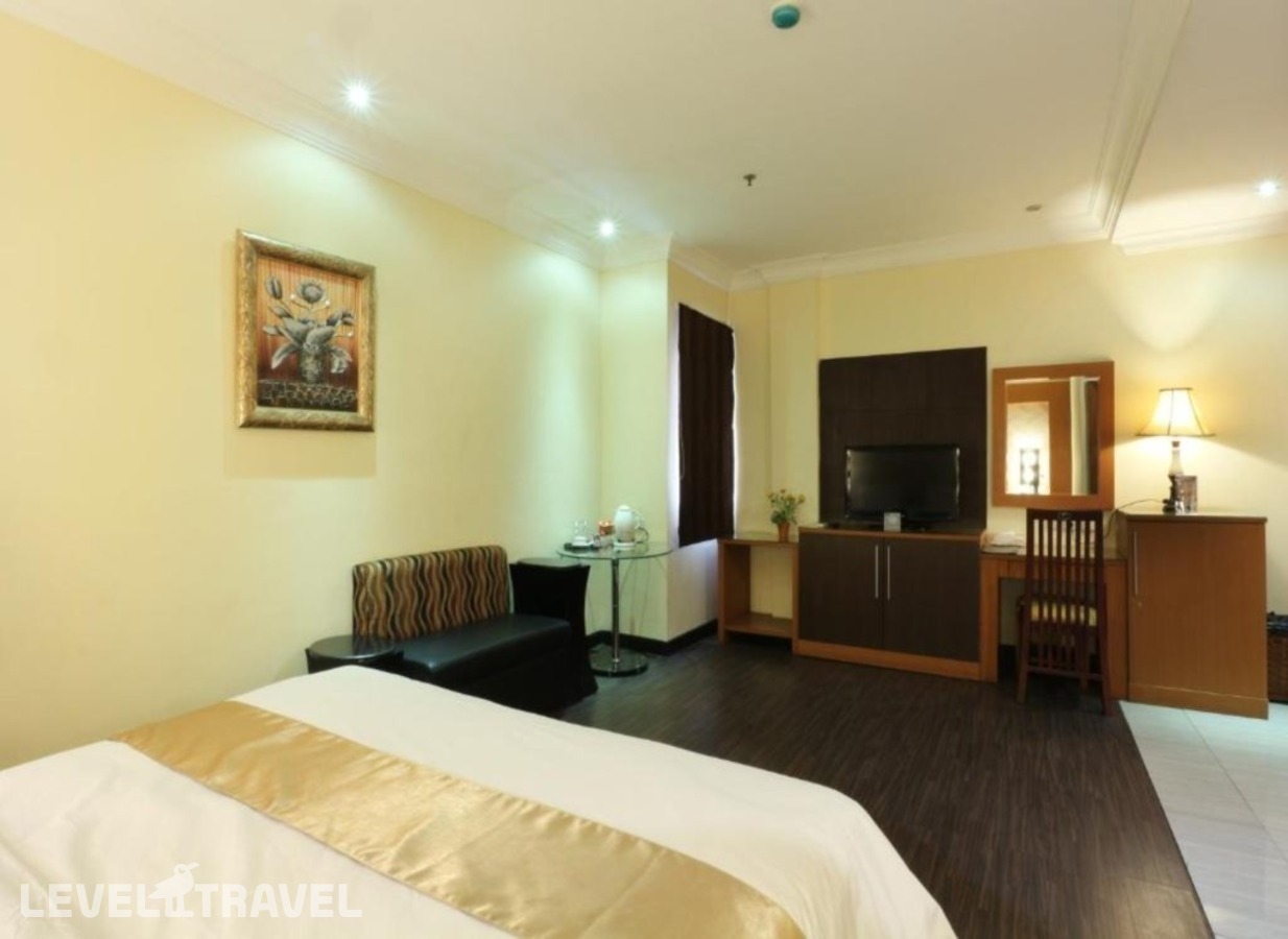 фотографии номера Номер Представительский отеля Coin's Hotel Jakarta в Индонезия(Джакарта) - фото №8