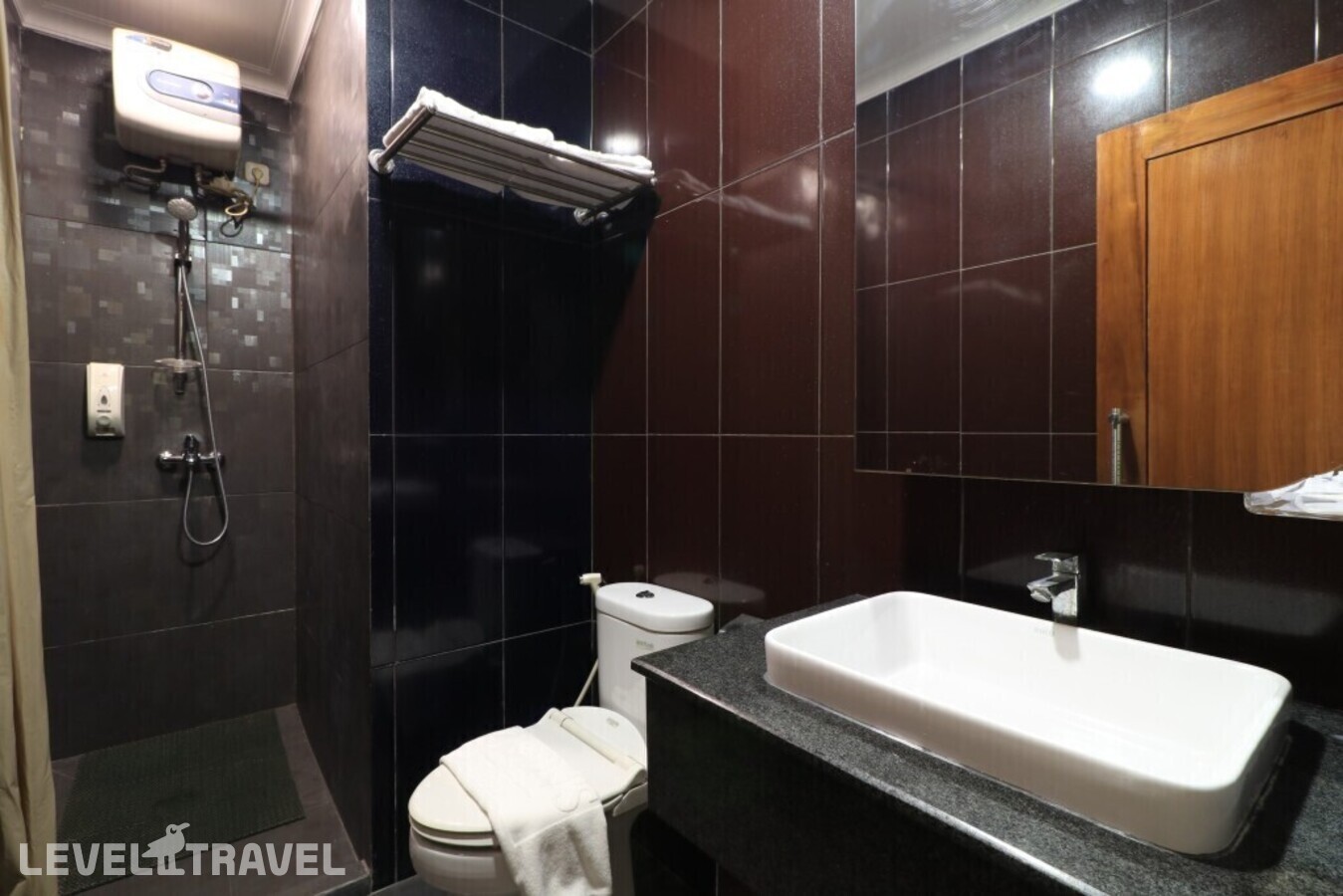 фотографии номера Полулюкс отеля Coin's Hotel Jakarta в Индонезия(Джакарта) - фото №6
