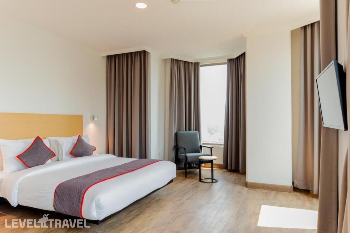 фотографии номера Делюкс отеля Oyo Townhouse 2 Hotel Gunung Sahari в Индонезия(Джакарта) - фото №5