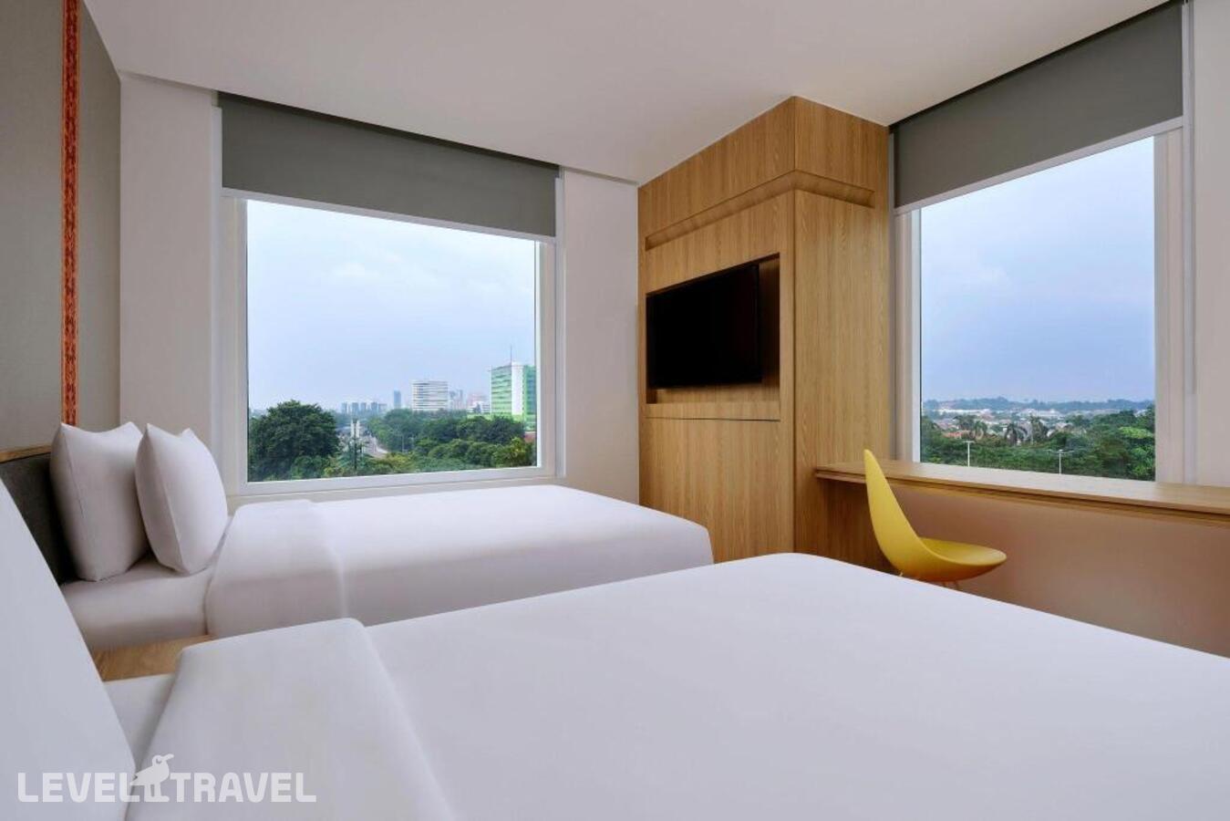 фотографии номера Делюкс (две односпальные кровати) отеля Aloft South Jakarta Chse Certified в Индонезия(Джакарта) - фото №1