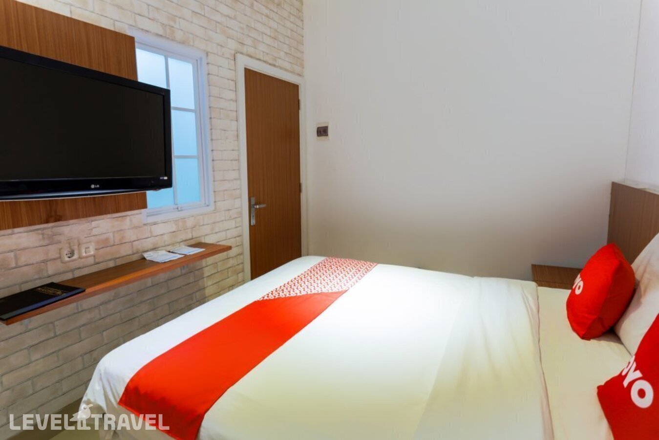 фотографии номера Стандартный номер отеля Oyo 3109 Point Inn в Индонезия(Джакарта) - фото №3