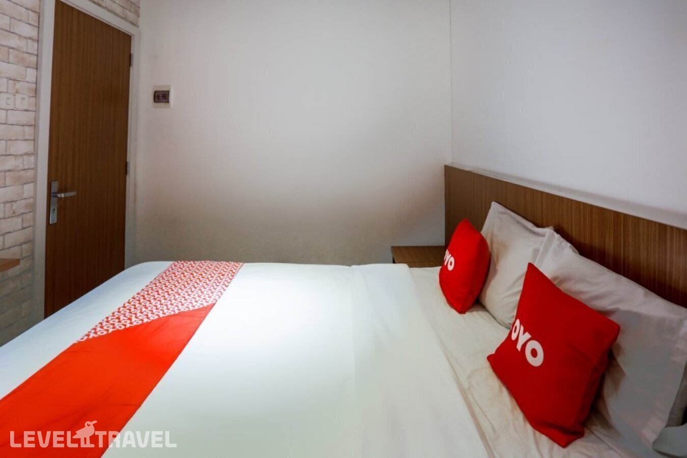 фотографии номера Стандартный номер отеля Oyo 3109 Point Inn в Индонезия(Джакарта) - фото №1
