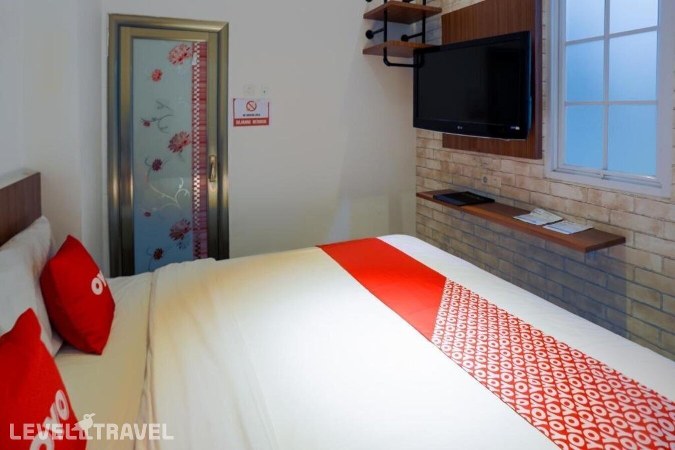 фотографии номера Стандартный номер отеля Oyo 3109 Point Inn в Индонезия(Джакарта) - фото №9