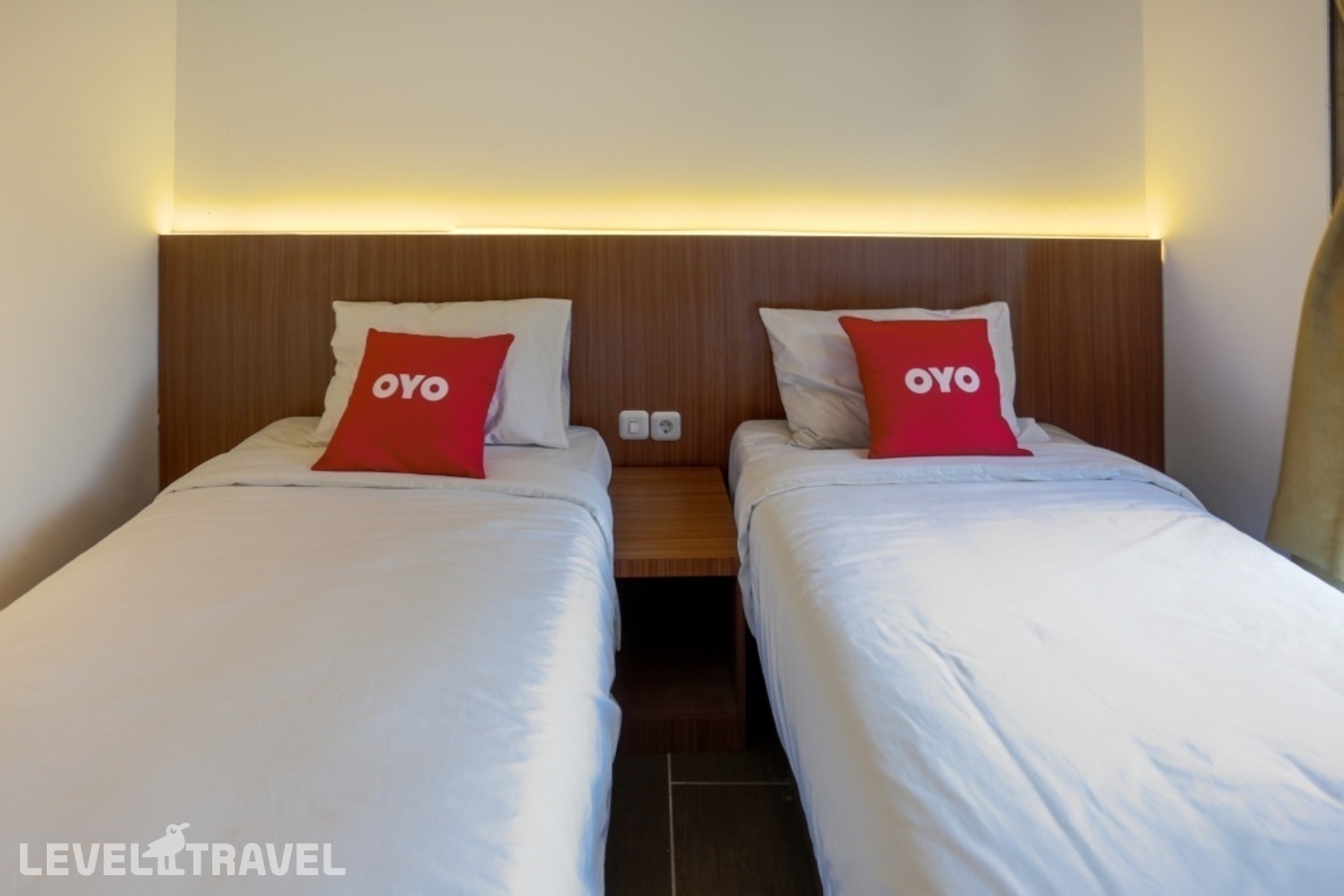 фотографии номера Стандартный (две односпальные кровати) отеля Oyo 3109 Point Inn в Индонезия(Джакарта) - фото №3