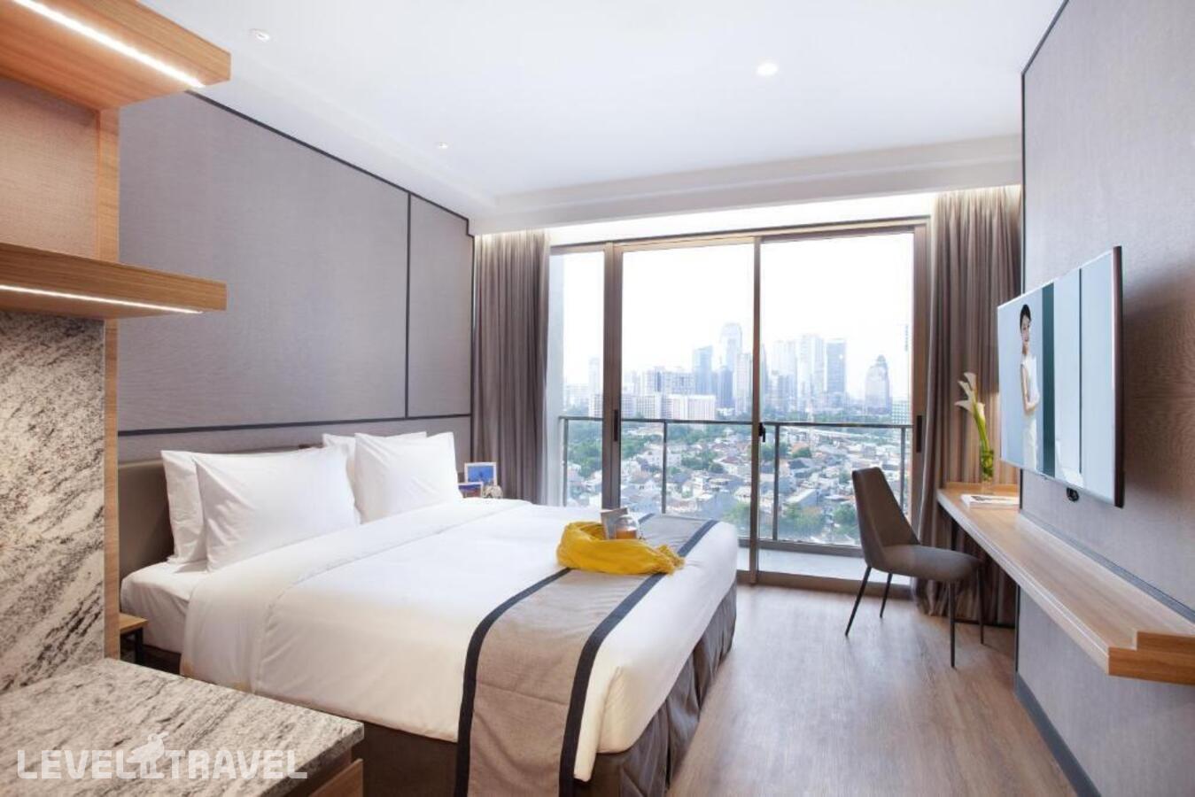 фотографии номера Номер Представительский отеля Somerset Sudirman Jakarta в Индонезия(Джакарта) - фото №4