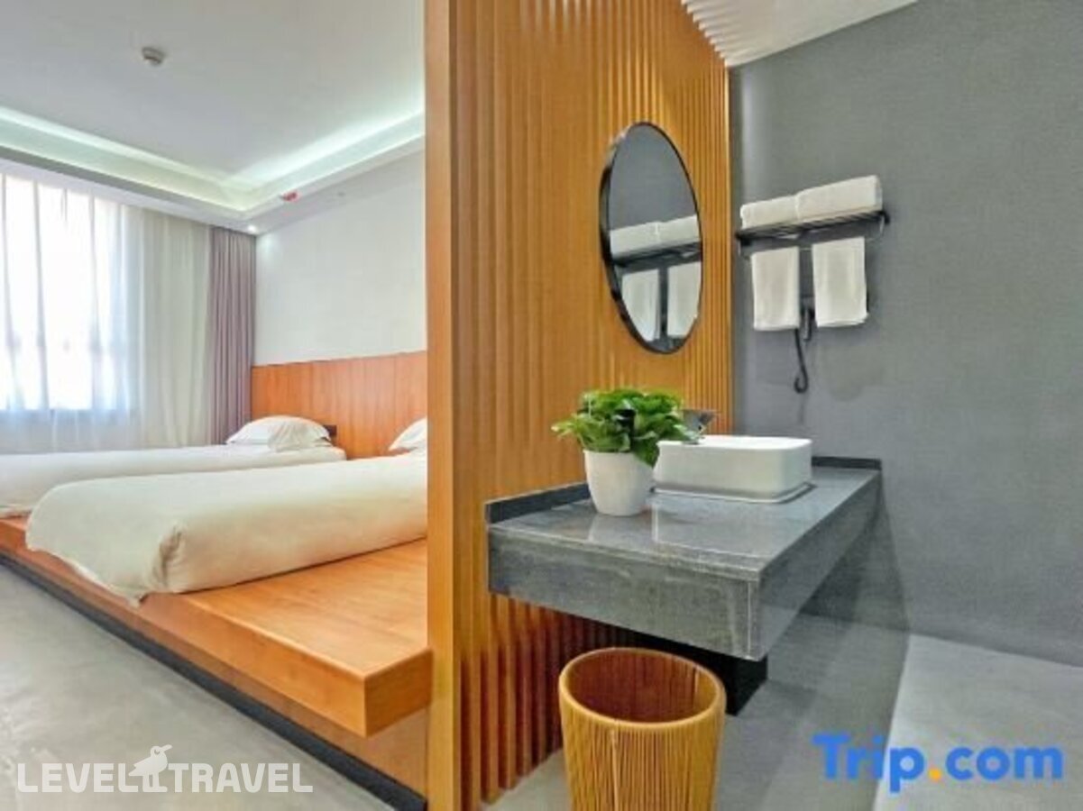 фотографии номера Стандартный номер отеля Shanghai Linyin Holiday Hotel в Китай(Шанхай) - фото №1