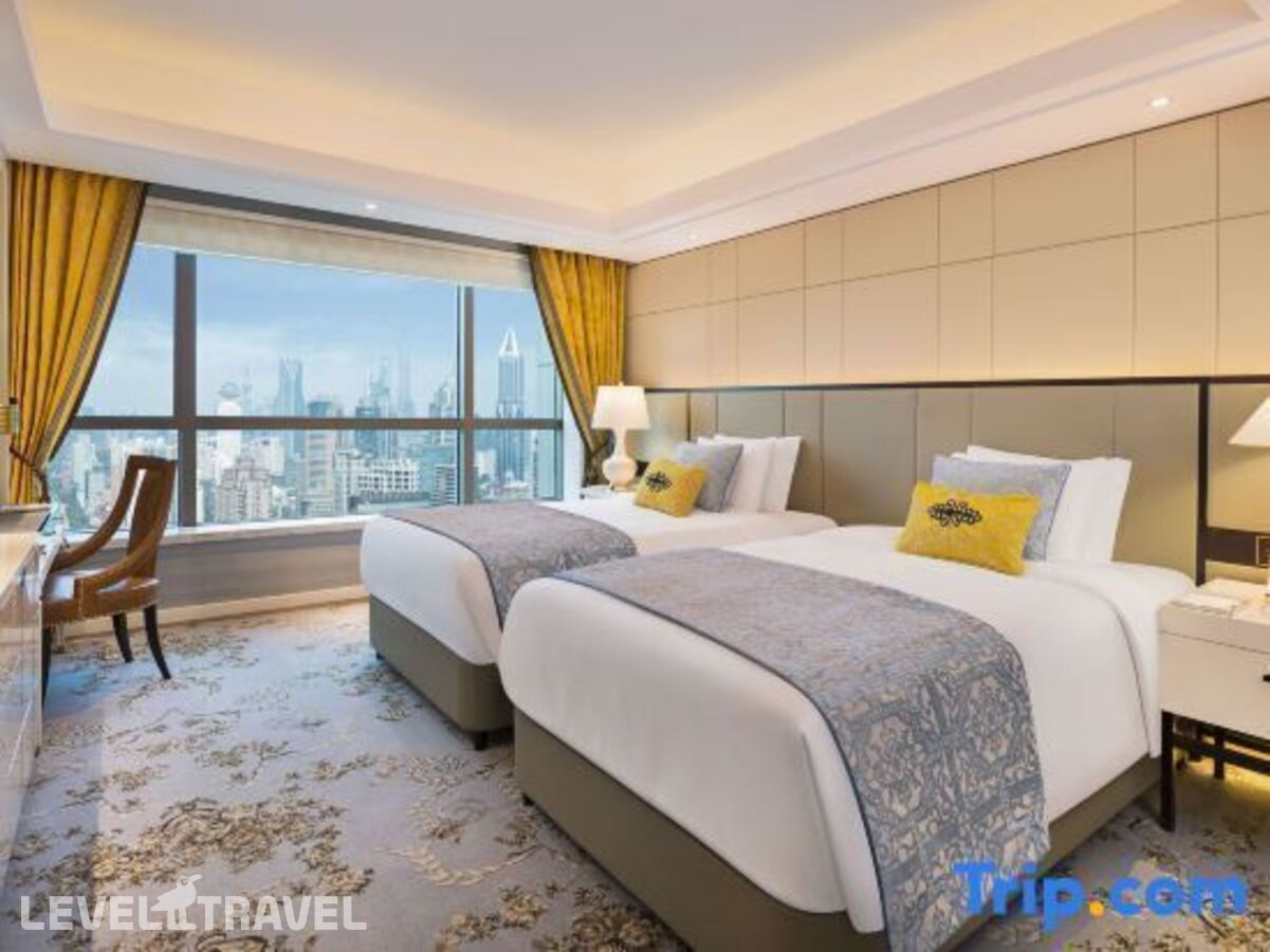 фотографии номера Делюкс (две односпальные кровати) отеля The St. Regis Shanghai Jingan в Китай(Шанхай) - фото №2