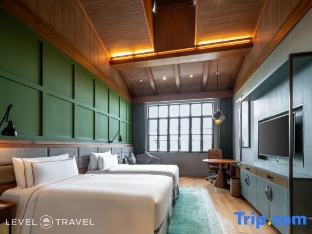 фотографии номера Делюкс (две односпальные кровати) отеля Meliá Shanghai Parkside в Китай(Шанхай) - фото №1