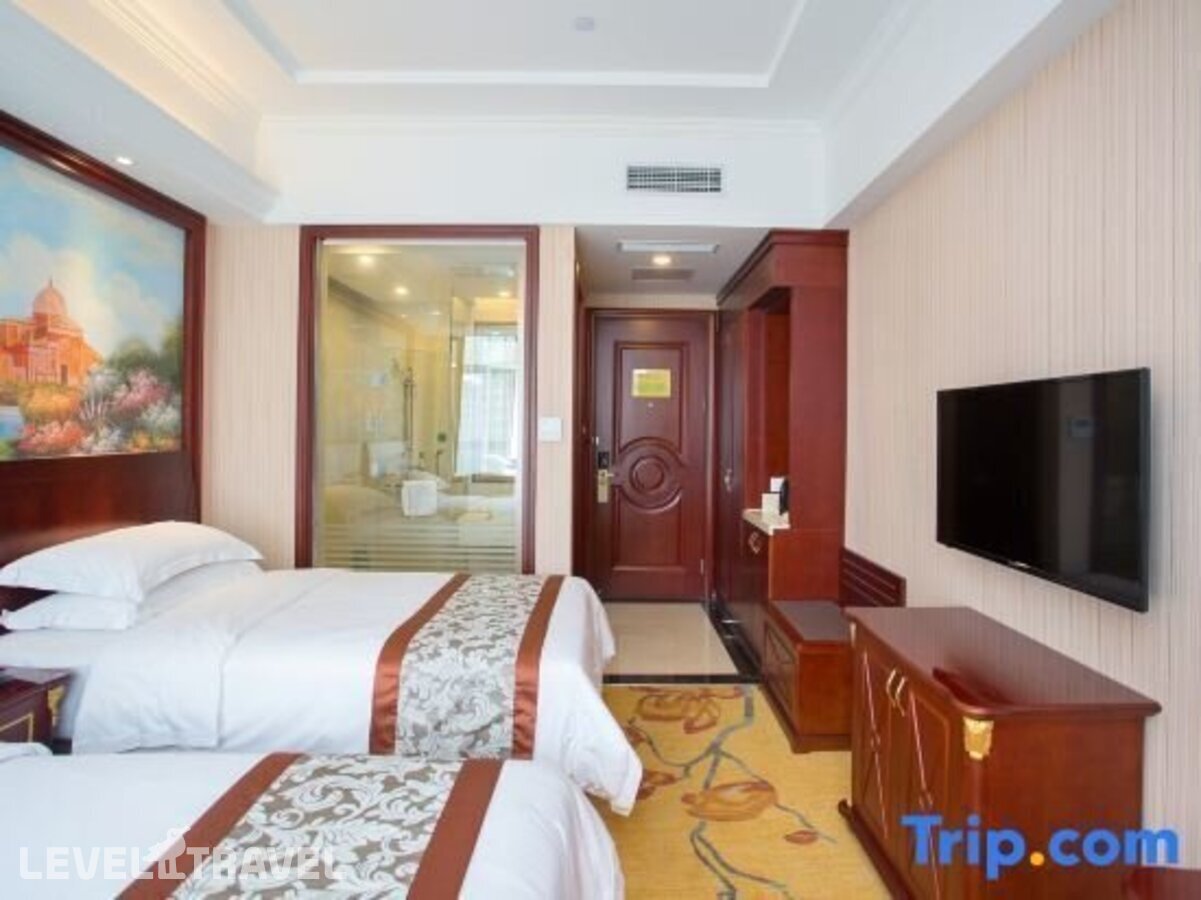 фотографии номера Стандартный (две односпальные кровати) отеля Vienna Hotel Shanghai Hongqiao Xujing в Китай(Шанхай) - фото №5