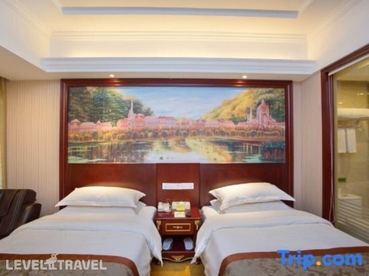 фотографии номера Стандартный (две односпальные кровати) отеля Vienna Hotel Shanghai Hongqiao Xujing в Китай(Шанхай) - фото №4