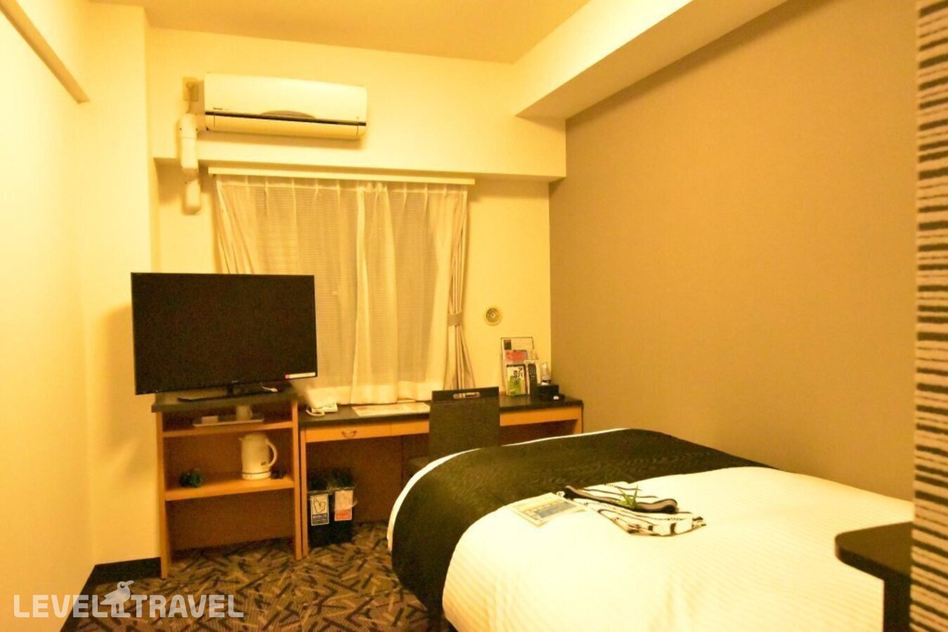 фотографии номера Стандартный номер отеля Apa Hotel Machidaeki-Higashi в Япония(Токио) - фото №1