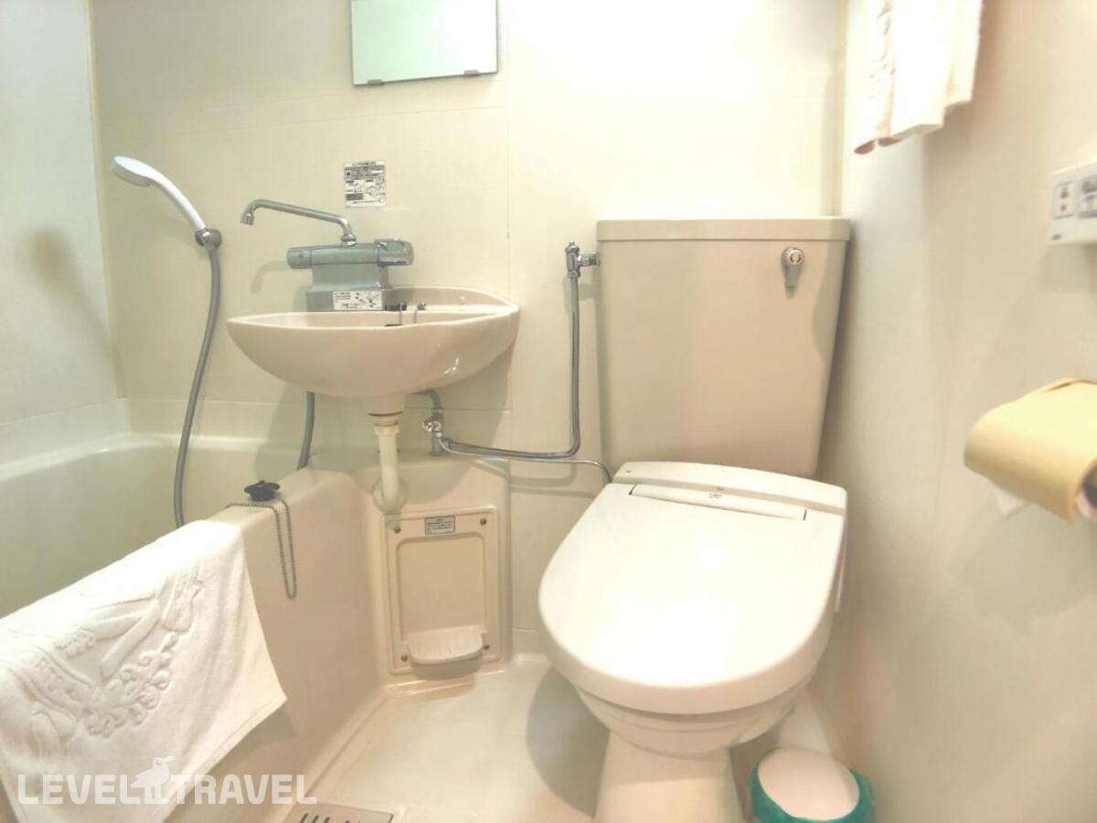 фотографии номера Стандартный (две односпальные кровати) отеля Apa Hotel Machidaeki-Higashi в Япония(Токио) - фото №11