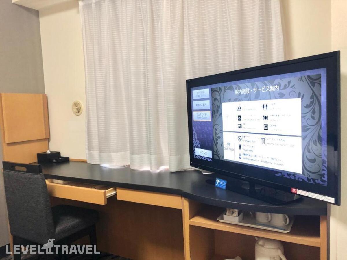 фотографии номера Стандартный (две односпальные кровати) отеля Apa Hotel Machidaeki-Higashi в Япония(Токио) - фото №5