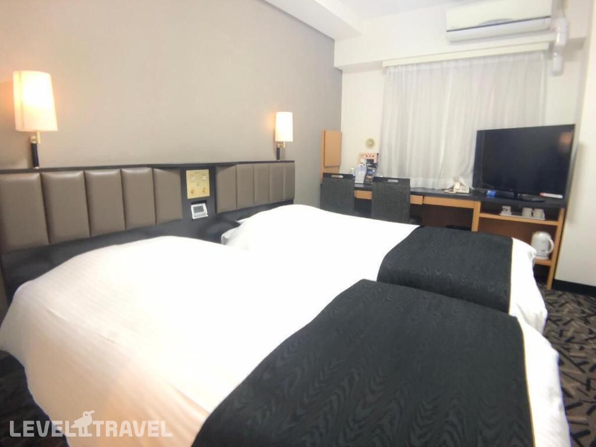 фотографии номера Стандартный (две односпальные кровати) отеля Apa Hotel Machidaeki-Higashi в Япония(Токио) - фото №8
