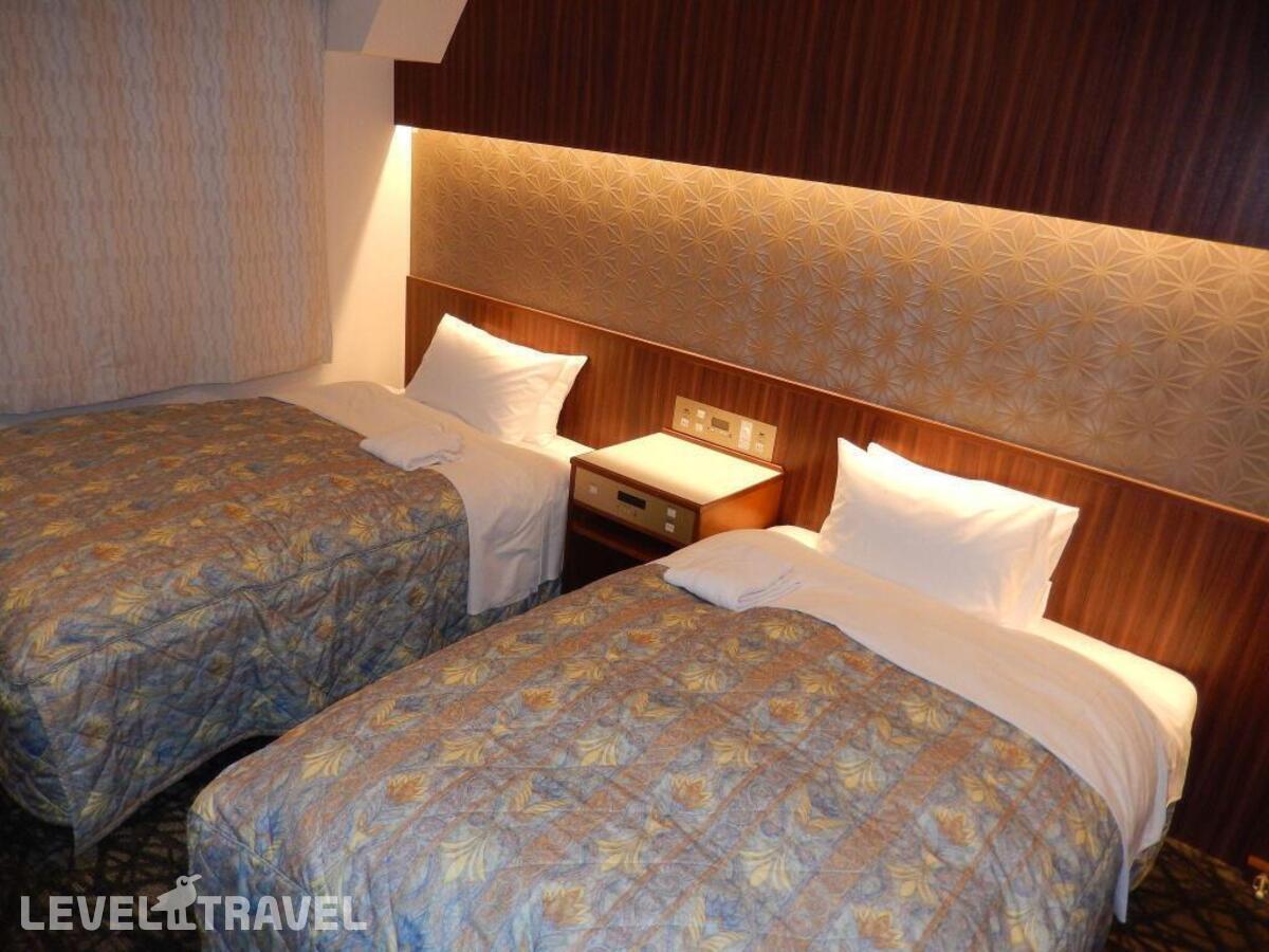фотографии номера Стандартный (две односпальные кровати) отеля Shinjukuya Hotel в Япония(Токио) - фото №1