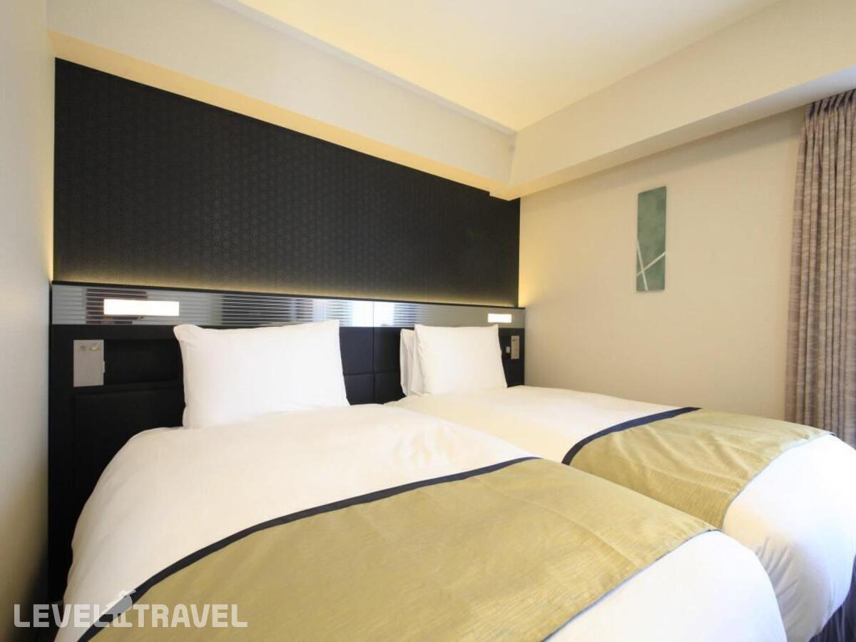 фотографии номера Стандартный (две односпальные кровати) отеля Richmond Hotel Premier Asakusa International в Япония(Токио) - фото №2