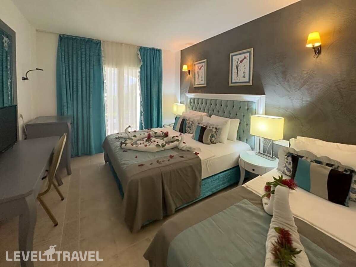 фотографии номера Семейный (двухъярусная кровать) отеля Tiana Beach Hotel в Турция(Кадикале) - фото №7