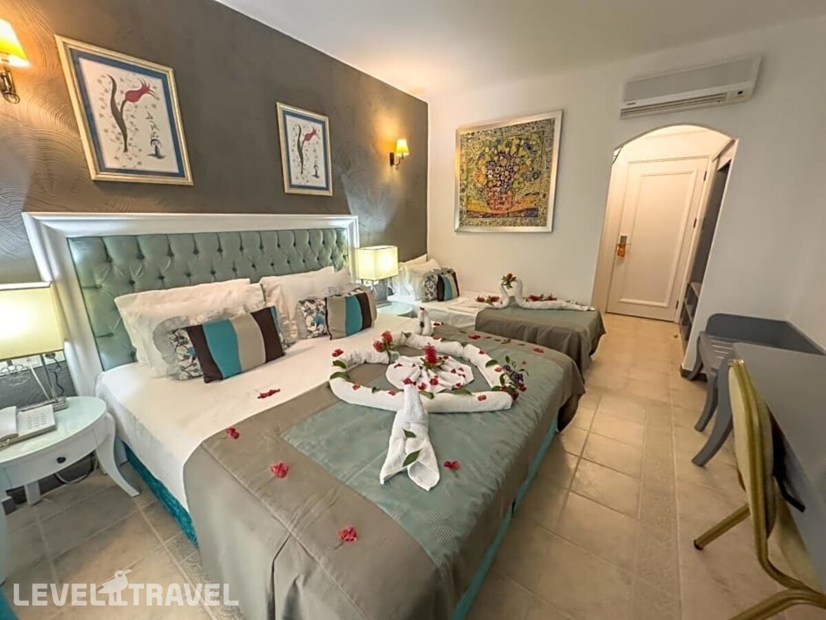 фотографии номера Семейный (двухъярусная кровать) отеля Tiana Beach Hotel в Турция(Кадикале) - фото №8