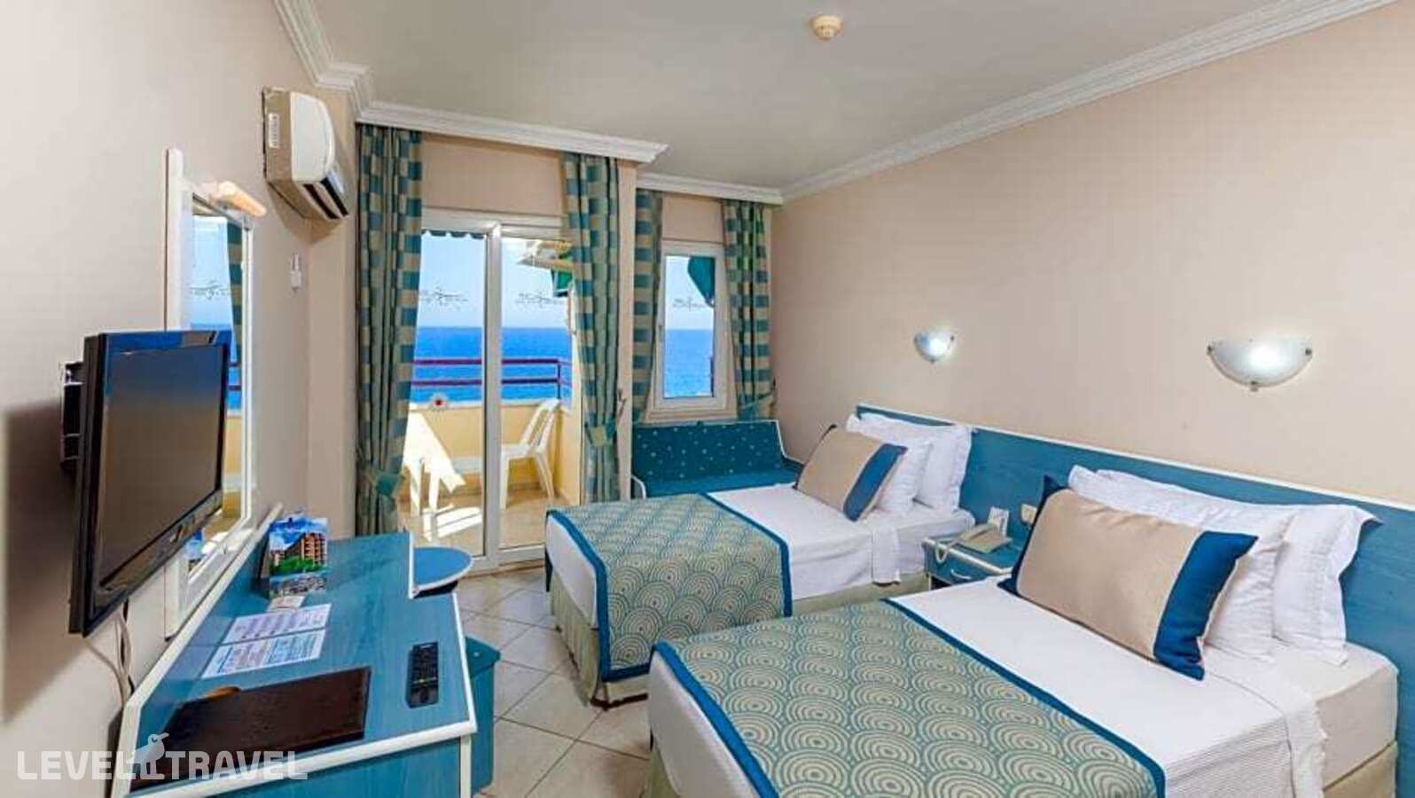 фотографии номера Стандартный с балконом с частичным видом на море отеля Galaxy Beach Hotel в Турция(Махмутлар) - фото №7