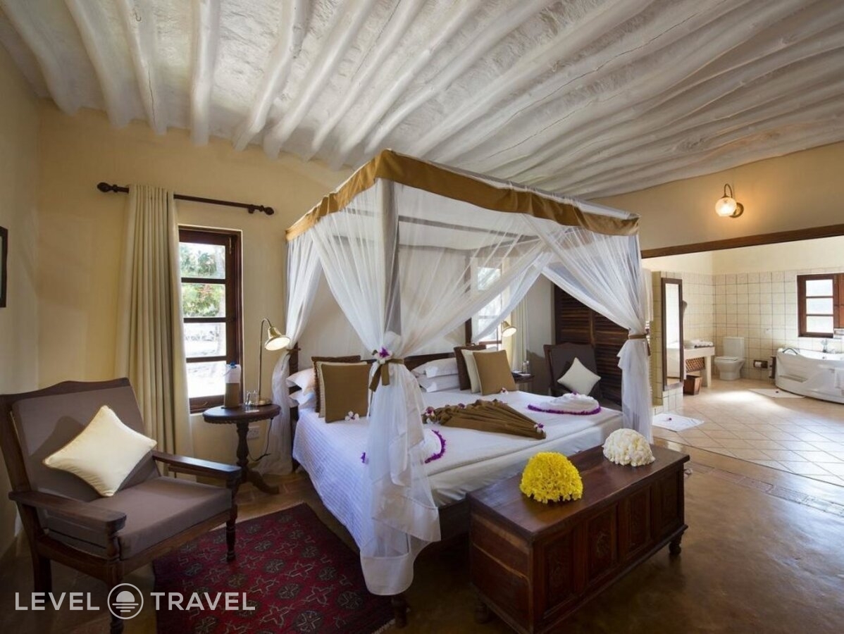 фотографии номера Люкс пляжный отеля Neptune Pwani Beach Resort & Spa в Танзания(Пвани Мчангани) - фото №1