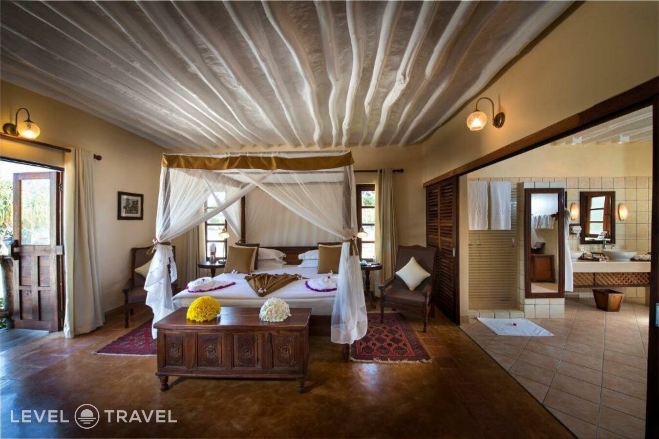 фотографии номера Люкс пляжный отеля Neptune Pwani Beach Resort & Spa в Танзания(Пвани Мчангани) - фото №3
