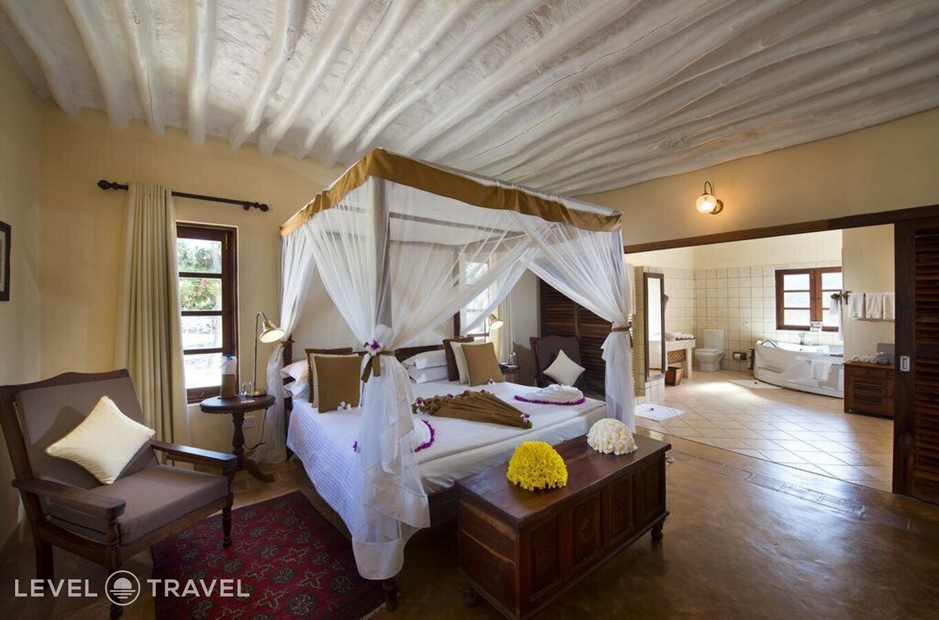фотографии номера Люкс пляжный отеля Neptune Pwani Beach Resort & Spa в Танзания(Пвани Мчангани) - фото №5