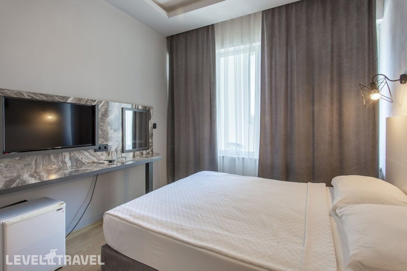 фотографии номера Стандартный с балконом (две односпальные кровати) отеля Aslan City Hotel (Ex. Aska Beste) в Турция(Аланья - центр) - фото №2
