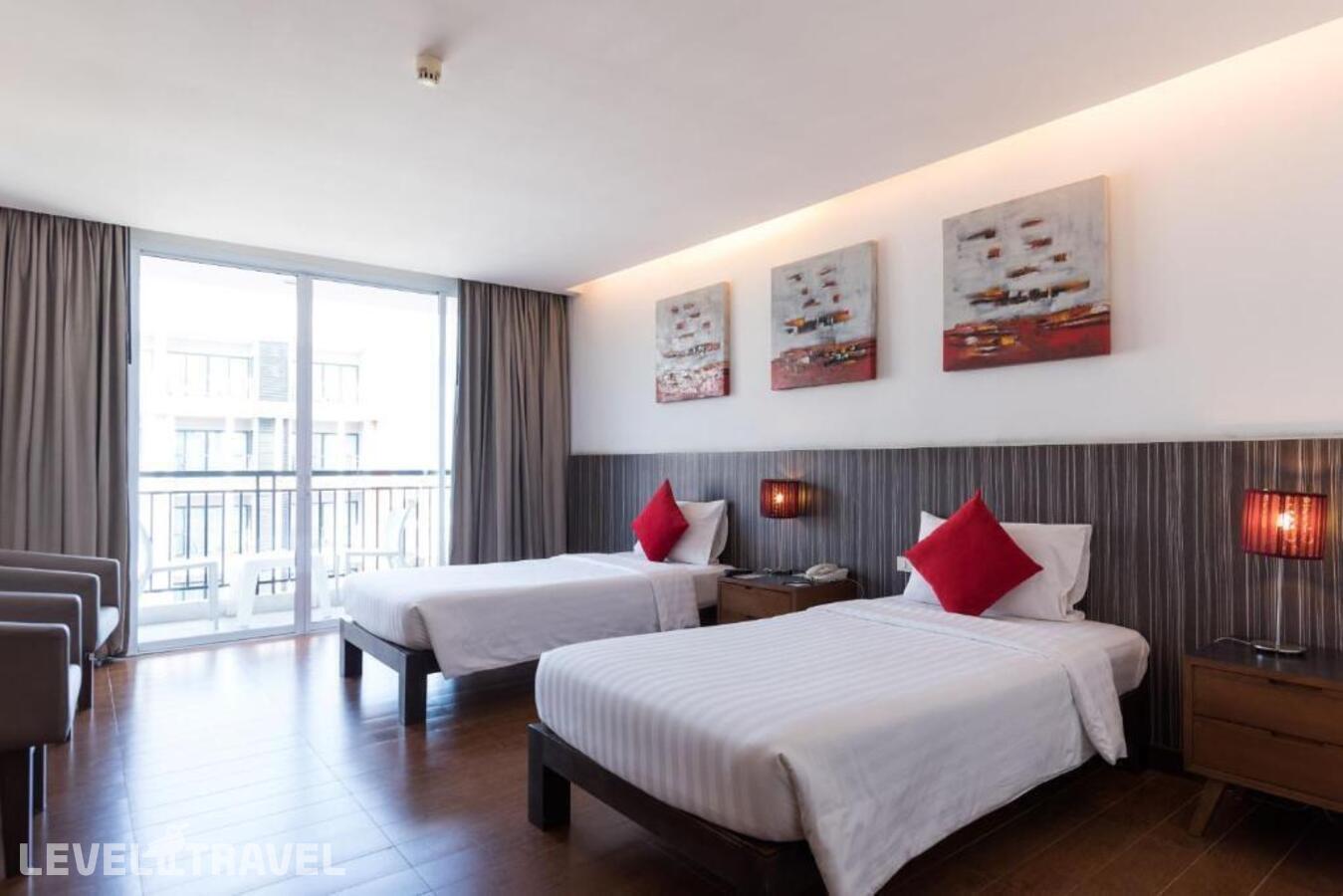 фотографии номера Делюкс с видом на город (две односпальные кровати) отеля Hotel J Pattaya в Таиланд(Центральная Паттайя) - фото №1