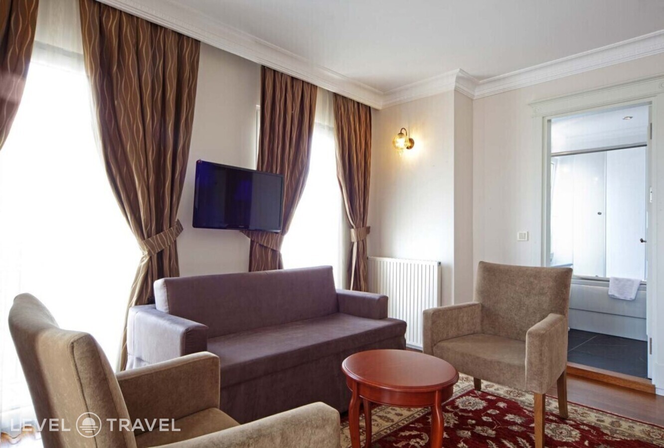 фотографии номера Делюкс с видом на море (две односпальные кровати) отеля Aren Suites Hotel в Турция(Фатих) - фото №9
