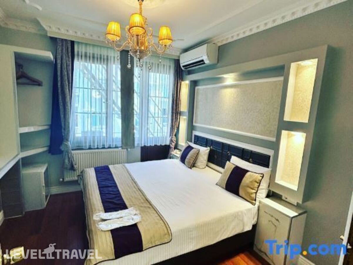 фотографии номера Трехместный с видом на город отеля Bakirkoy Tashan Business & Airport Hotel (Ex. Best Western Tashan Business) в Турция(Бакыркёй) - фото №3